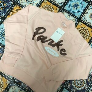 Parke Light Pink Mock Neck Sweatershirt With Miami Retro Badge size Large/ XL